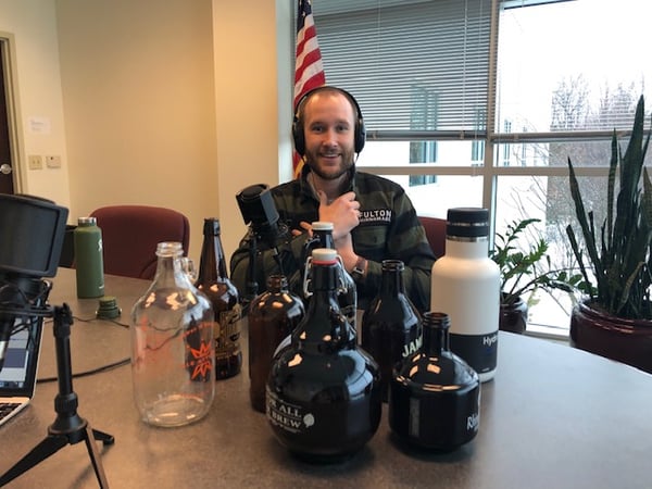 Lance Taylor with variety of growlers