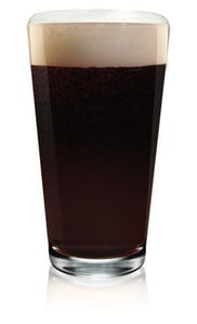 Pint glass with dark beer