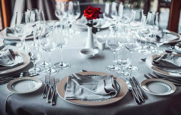 Table set with red rose